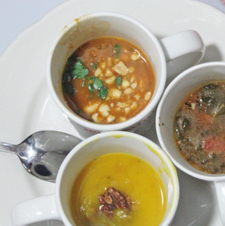 Clockwise: African Peanut Stew, Tortellini and Italian Sausage Soup, Kabocha Squash Soup with Candied Pecans. 
